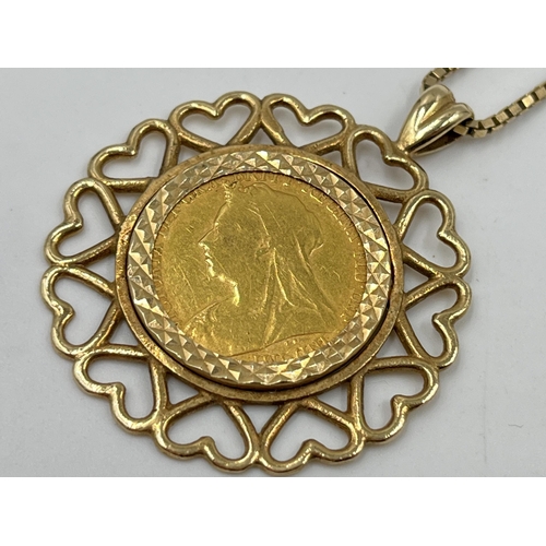 1242 - A 1897 Queen Victoria half sovereign with hallmarked 9ct gold mount and 9ct gold chain necklace - ap... 