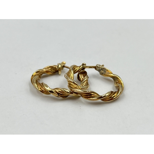 1244 - A pair of 9ct gold twisted hoop earrings - approx. gross weight 1.75 grams