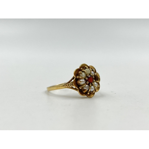 1247 - A hallmarked 9ct gold garnet and seed pearl floral ring, size T - approx. gross weight 3.86 grams