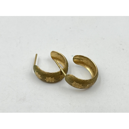 1250 - A pair of hallmarked 9ct gold half hoop earrings - approx. gross weight 1.41 grams