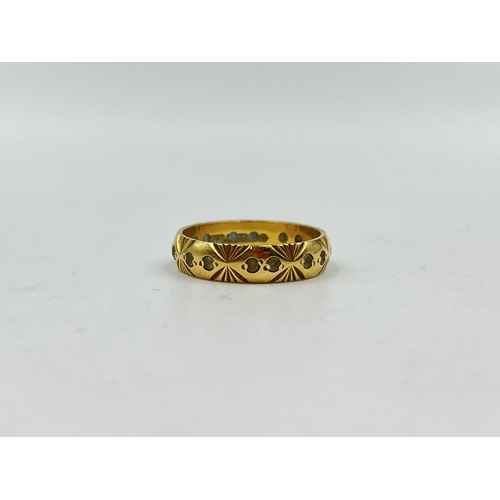 1251 - A hallmarked 18ct gold textured clear gemstone eternity ring, size M - approx. gross weight 3.16 gra... 