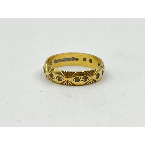 1251 - A hallmarked 18ct gold textured clear gemstone eternity ring, size M - approx. gross weight 3.16 gra... 