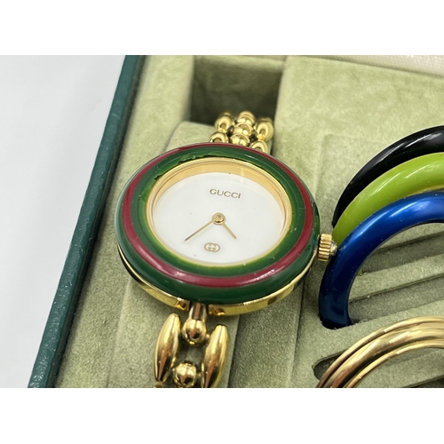 1275 - A vintage boxed Gucci 11/12 bezel change quartz lady's wristwatch with 5 bezels