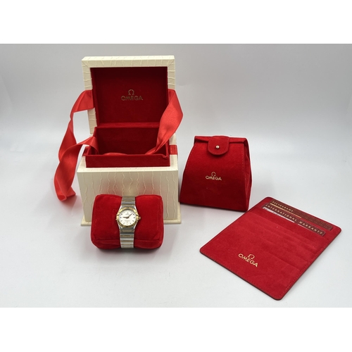 1277 - A boxed Omega Constellation 18ct gold and steel quartz 25mm wristwatch - ref. 6552/864 together with... 