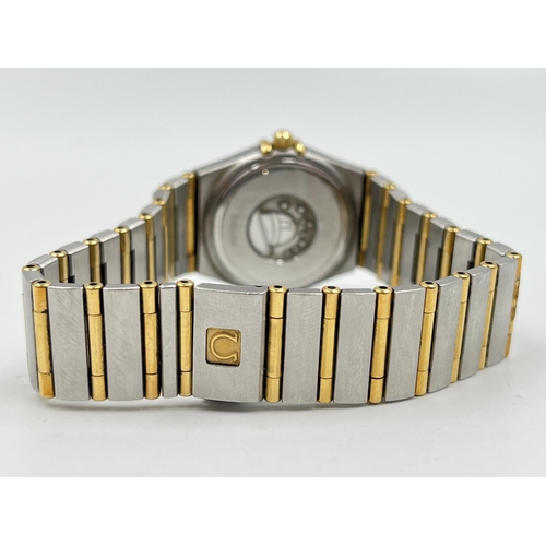 1277 - A boxed Omega Constellation 18ct gold and steel quartz 25mm wristwatch - ref. 6552/864 together with... 