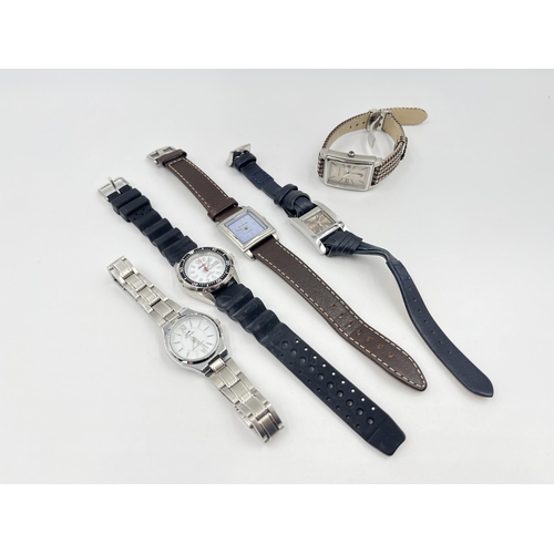 1283 - Five quartz lady's wristwatches to include two Emporio Armani etc.