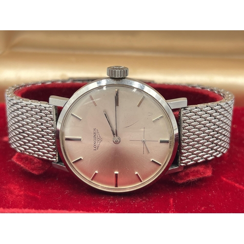 1294 - A boxed 1960s Longines cal. 30L mechanical 35mm men's wristwatch with later added Tissot Milanese br... 