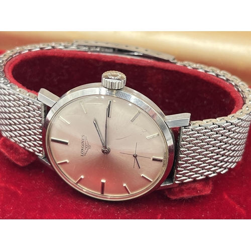 1294 - A boxed 1960s Longines cal. 30L mechanical 35mm men's wristwatch with later added Tissot Milanese br... 