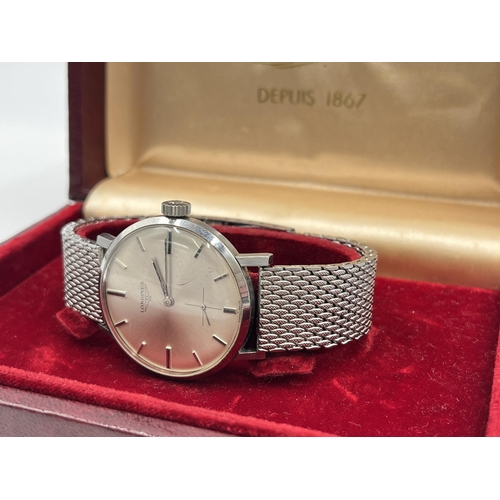 1294 - A boxed 1960s Longines cal. 30L mechanical 35mm men's wristwatch with later added Tissot Milanese br... 