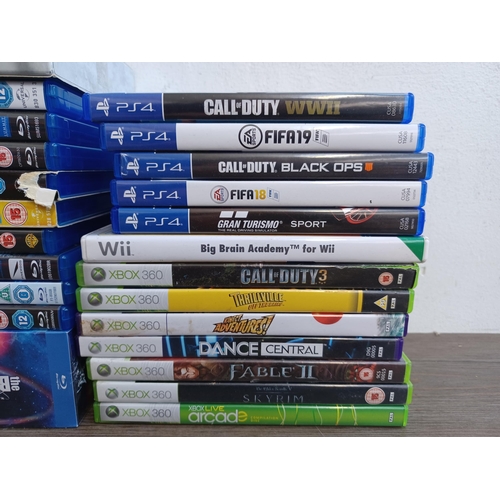 838 - A collection of rock CDs, PS4 and Xbox 360 game discs and Blu-rays with sealed titles to include The... 