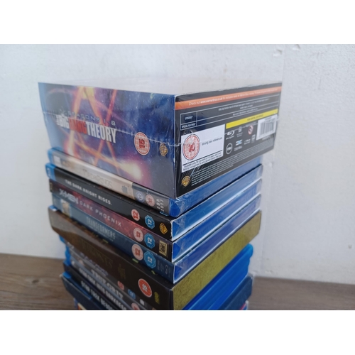 838 - A collection of rock CDs, PS4 and Xbox 360 game discs and Blu-rays with sealed titles to include The... 