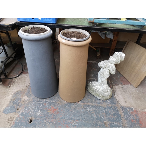 967B - Three garden items, one cast stone statue and two chimney pot planters