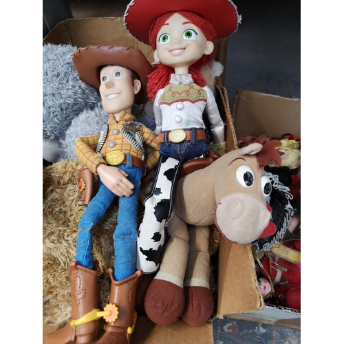 968A - Three boxes containing toys to include Toy Story Woody figurine, Toy Story Jessie and Bullseye figur... 