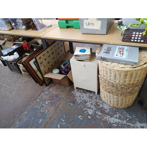 970B - Four boxes and two baskets containing board games, antique books, frames, cigarette cards, boxed flo... 