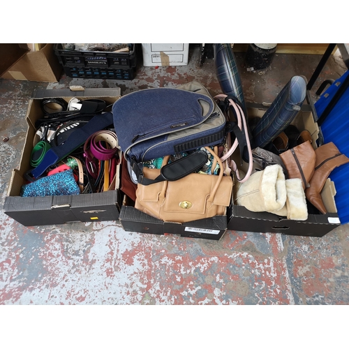 970C - Three boxes containing ladies fashion items comprising boots, belts and bags