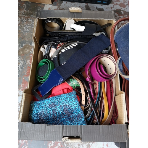 970C - Three boxes containing ladies fashion items comprising boots, belts and bags