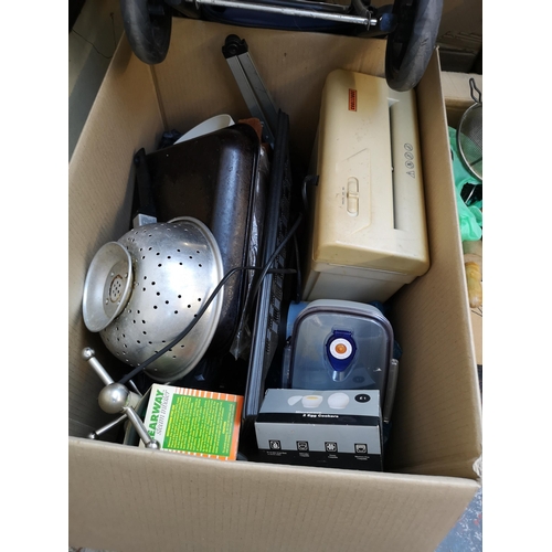 972A - Four boxes containing Quartz wall clock, kitchenware, ceramics, 19th century style footstool etc.