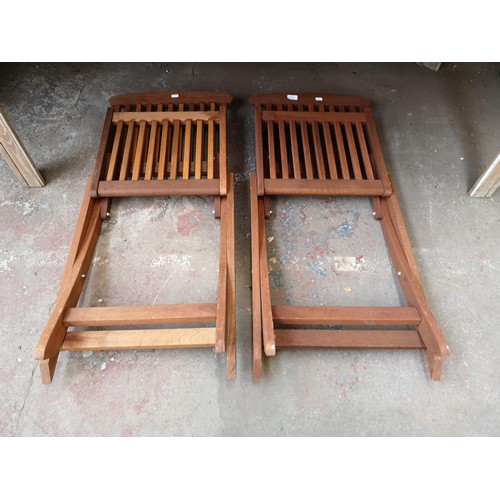 967A - Two teak folding garden chairs