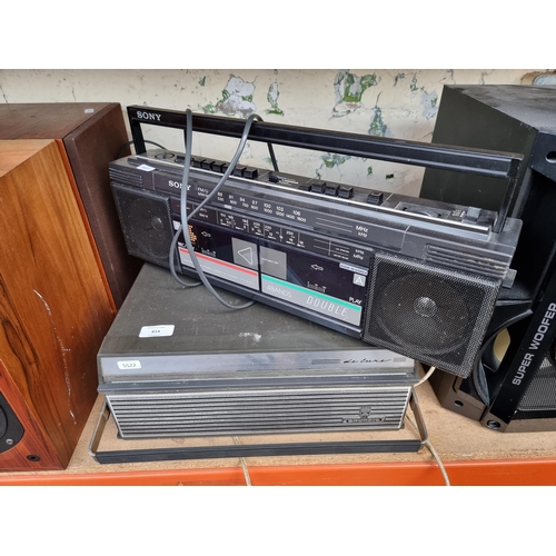 814 - Two items, one Sony CFS-W30L portable four-band radio/twin cassette and one Grundig De Luxe 
reel-to... 