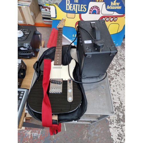 820 - Two items, one Squier Telecaster style electric guitar with case and one Stagg 10GA guitar practice ... 