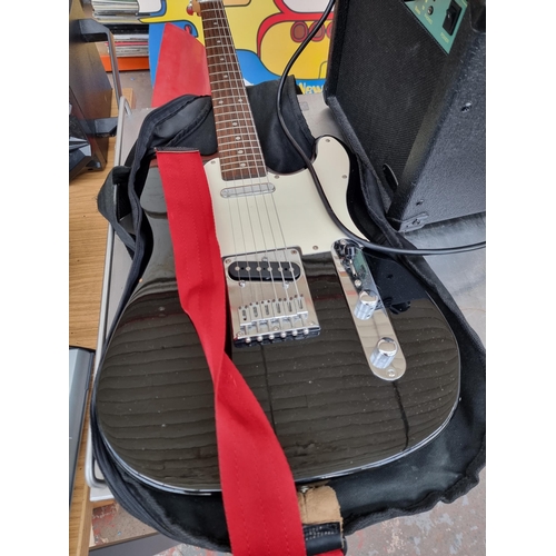 820 - Two items, one Squier Telecaster style electric guitar with case and one Stagg 10GA guitar practice ... 