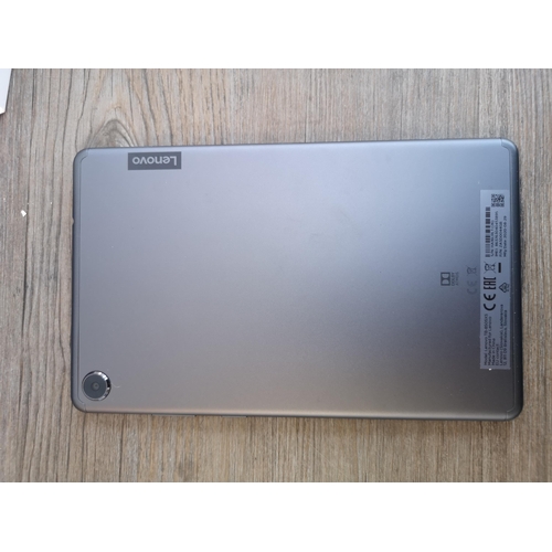 905 - A boxed Lenovo Smart Tab M8 tablet with charger, cable and instruction manuals