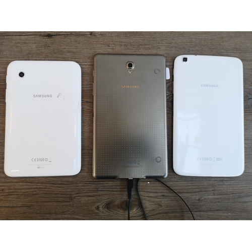 906 - Three Samsung tablets to include SM-T700 with charger