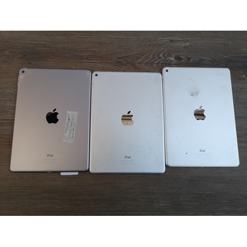 909 - Three Apple A1566 iPad tablets