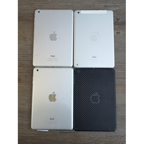 914 - Four Apple iPad Mini tablets to include two A1489 etc.