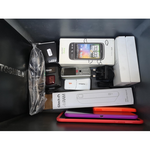 922 - A box containing Toshiba Windows 7 home premium notebook, mobile phones, two Hudl tablets, Canon min... 