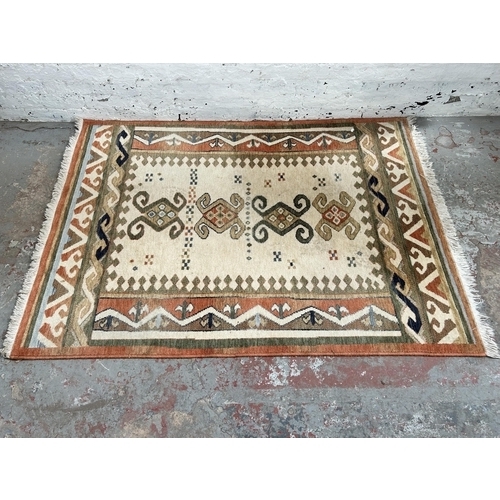 68 - A modern Persian style rug - approx. 188cm x 138cm