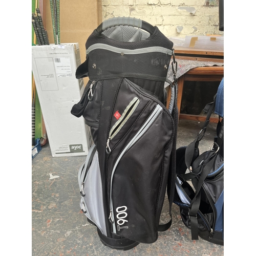 703 - Two golf bags containing Rife RX2 clubs