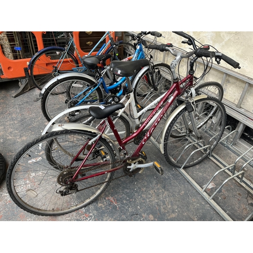 710A - Two women's town bikes, one Raleigh and one Claude