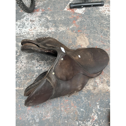 718 - An unbranded leather horse riding saddle