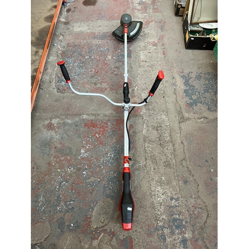 734 - An Einhell Agillo battery powered strimmer