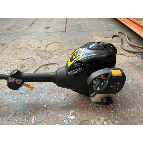 734A - A McCulloch Trimmac petrol strimmer