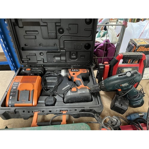 738 - A collection of tools to include Black & Decker 240v sander, Numax battery charger, Black & Decker c... 