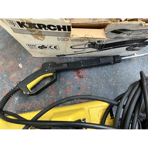 740 - Two items, one boxed Kärcher HD585 pressure washer and one Flymo Powerdash Trim 700 strimmer