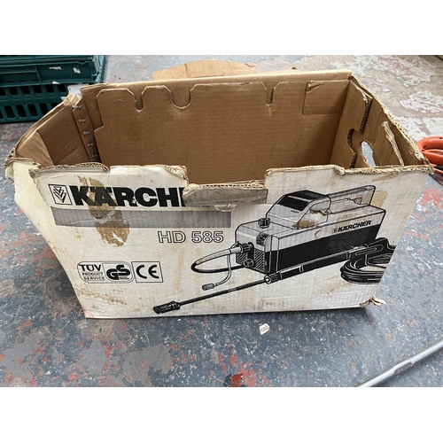 740 - Two items, one boxed Kärcher HD585 pressure washer and one Flymo Powerdash Trim 700 strimmer