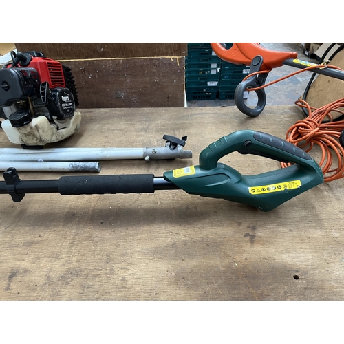 741 - Two Coopers long reach hedge cutters, one petrol with two attachments and one battery powered with a... 