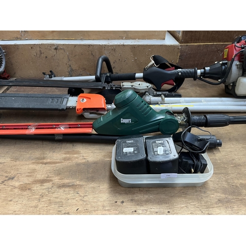 741 - Two Coopers long reach hedge cutters, one petrol with two attachments and one battery powered with a... 