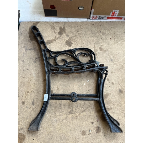 756 - A pair of cast iron bench ends