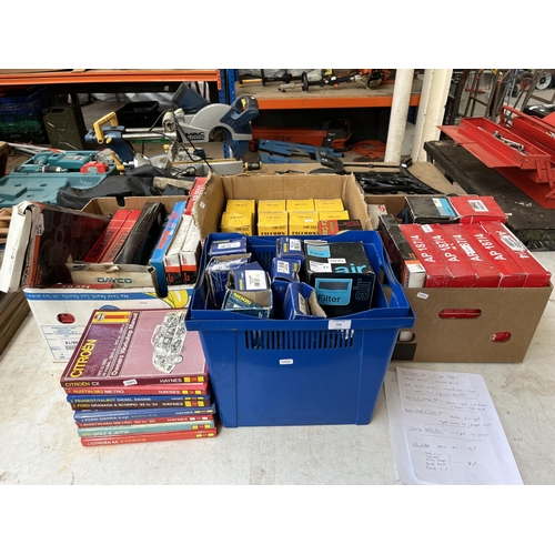 758 - A large collection of boxed car parts and car workshop manuals to include oil filters, timing belts,... 