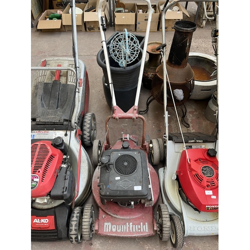 775 - A Mountfield petrol lawn mower with Briggs & Stratton petrol engine