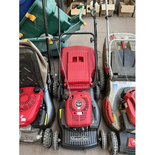 777 - A Mountfield RV40 petrol lawn mower with grass collector