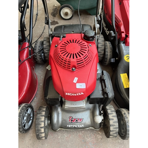 778 - A Honda petrol lawn mower with grass collector