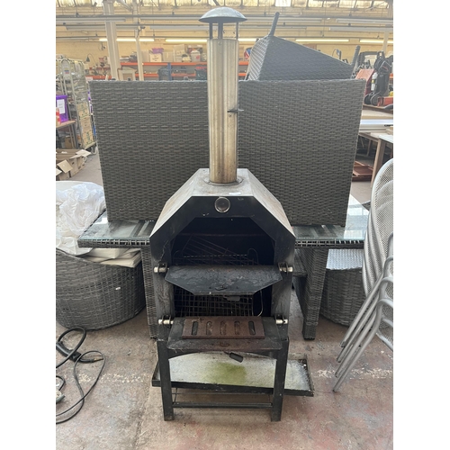 783 - A sheet metal BBQ oven with chimney flue - approx. 160cm high