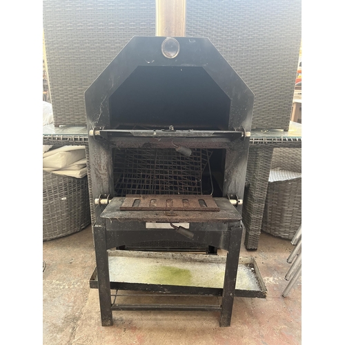 783 - A sheet metal BBQ oven with chimney flue - approx. 160cm high