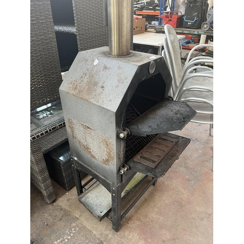 783 - A sheet metal BBQ oven with chimney flue - approx. 160cm high