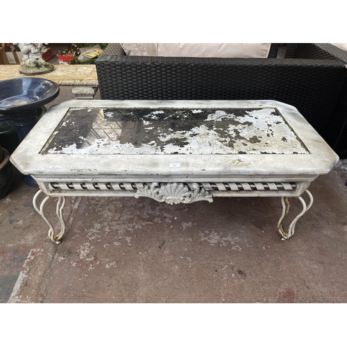 791 - A tubular metal and resin garden coffee table with glass top - approx. 48cm high x 120.5cm wide x 60... 